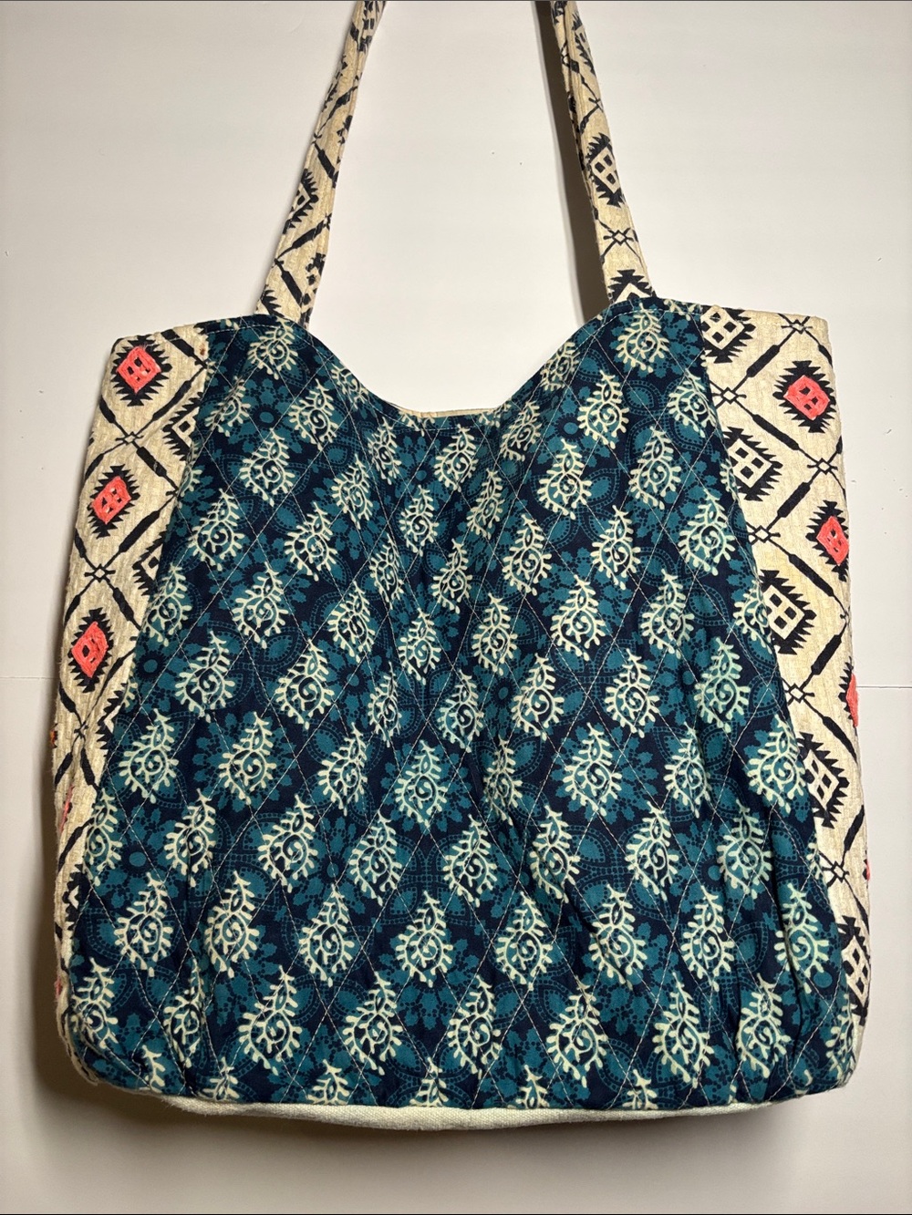 lovestitch Blue and White Patterned Shoulder Bag with Pink and Orange Tassels
